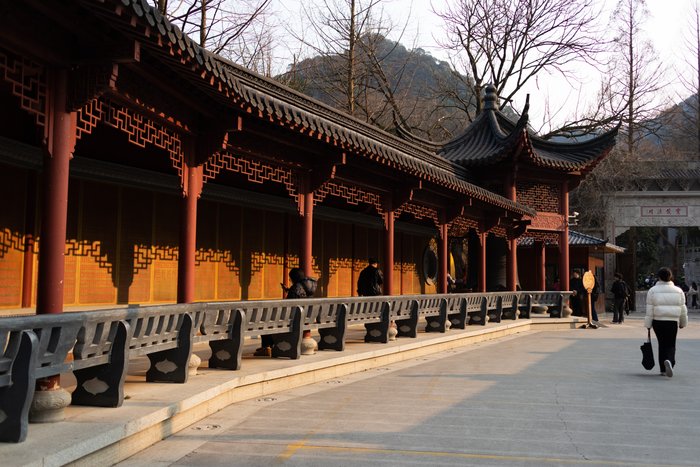 Silent Walk in Ancient Courtyard